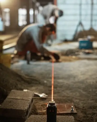 Laser level used to survey a floor