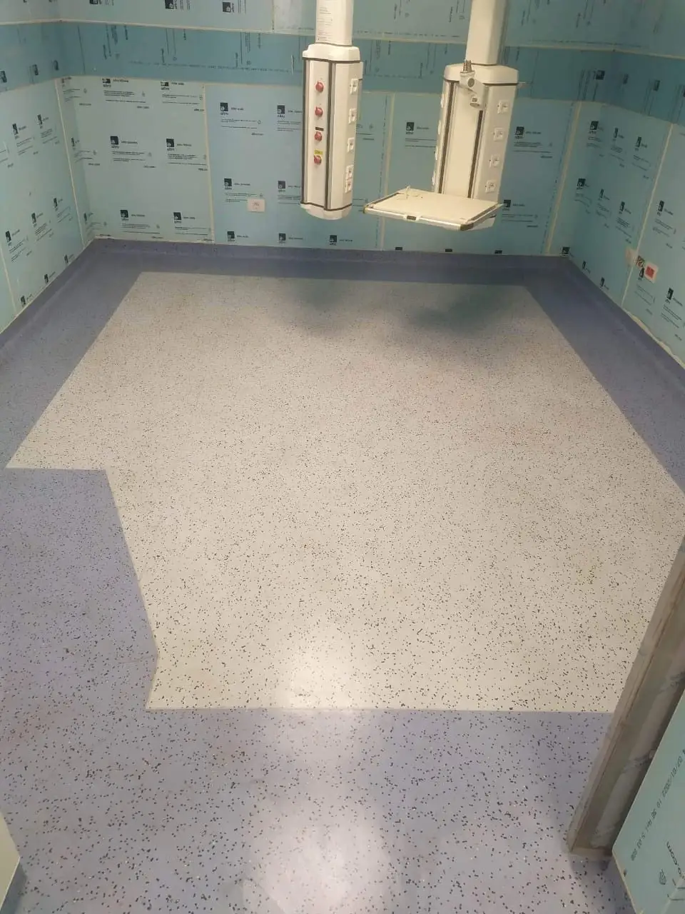 Speckled vinyl floor in an operating theatre
